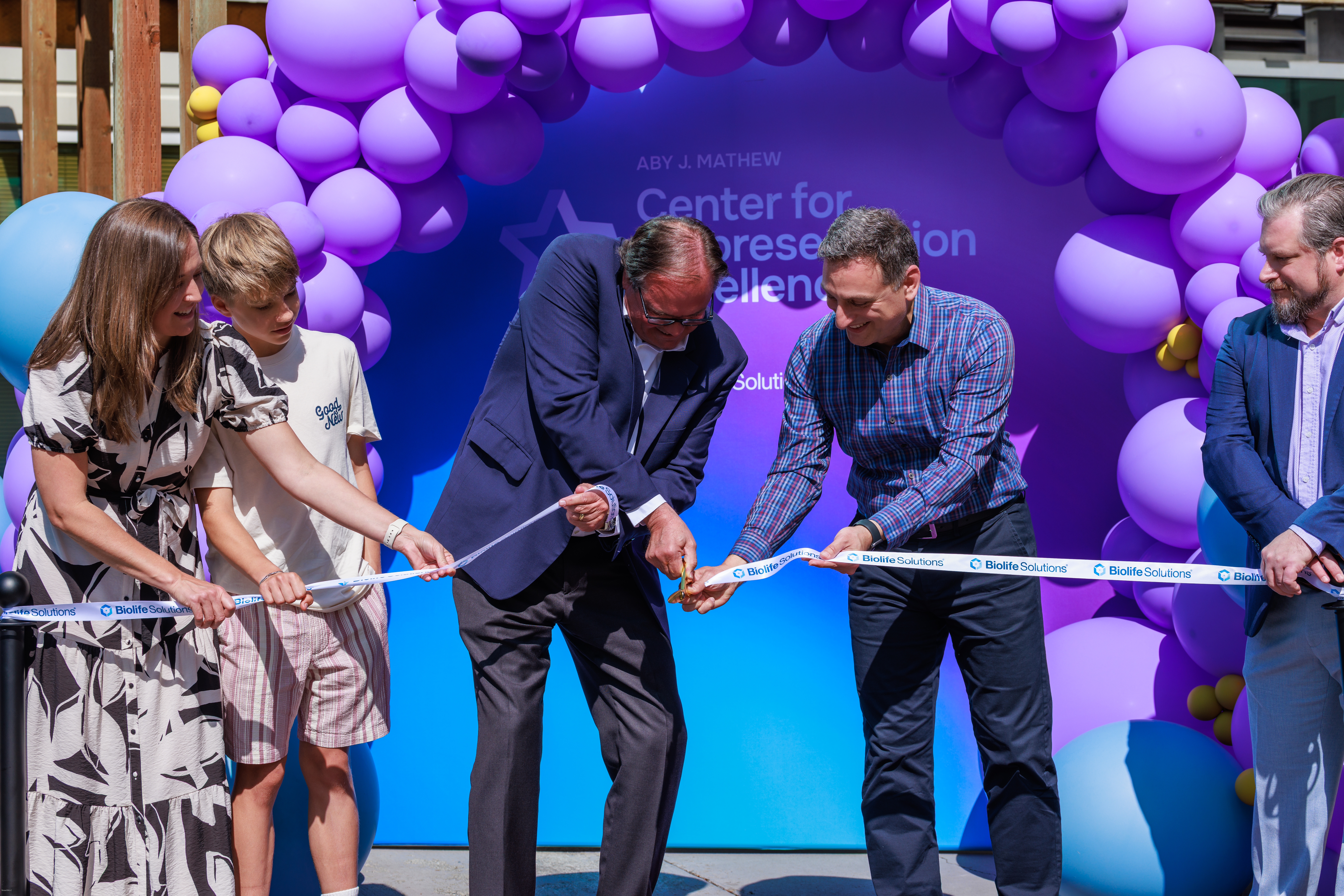 Guests and BioLife Solutions leaders participate in the Center for Biopreservation Excellence ribbon-cutting ceremony.